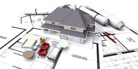 House mockup on architectÂs blueprints with rolled-up plans and miniature furnitureの写真素材