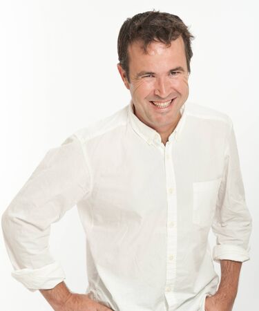 Portrait of a laughing man in a white backgroundの写真素材