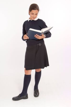 
Young girl consulting a big encyclopedia
の写真素材