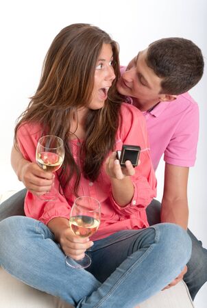 Engagement scene with young coupleの写真素材