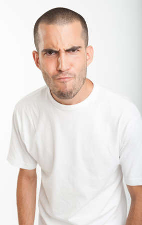 Portrait of an expressive young manの写真素材