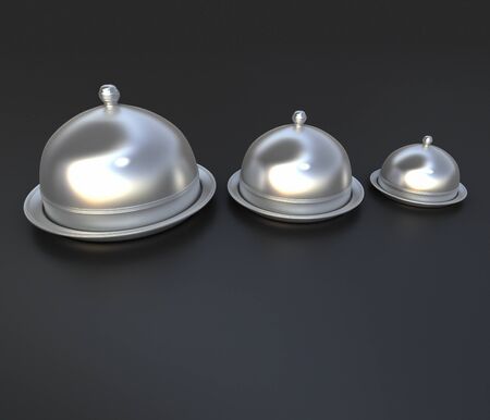 3D rendering of three chrome cloche lidsの写真素材