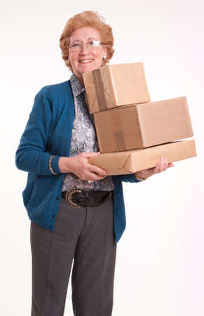 
Smiling senior woman holding a package
の写真素材