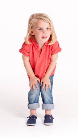
Cute little blonde girl in jeans and a red polo shirt
の写真素材