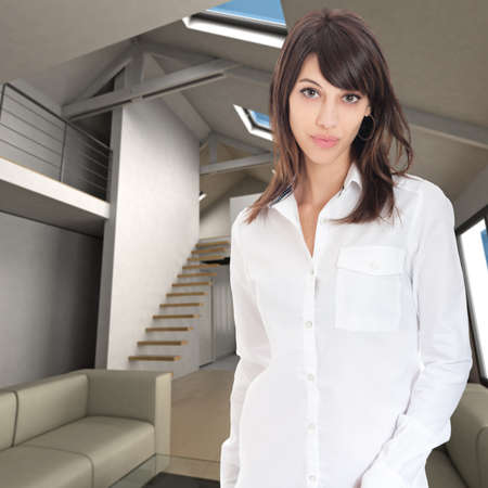 Young woman standing in a home interiorの写真素材