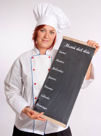 
Portrait of a professional female chef holding a menu slate
の写真素材