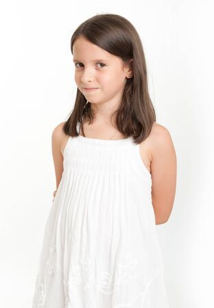 Young girl in white dressの写真素材