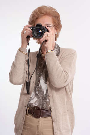 
Senior lady shooting with a camera
の写真素材