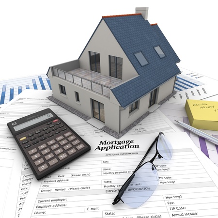 A house on top of a table with mortgage application form, calculator, blueprints, etc   の写真素材
