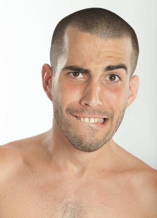 Young man with a scared expressionの写真素材