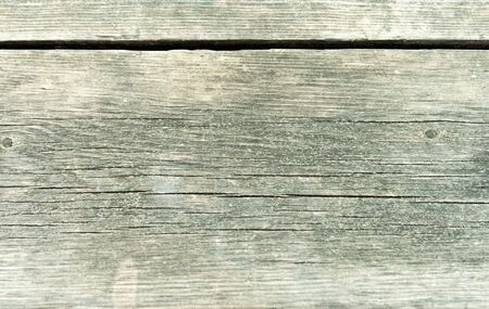 Old weather beaten wooden planksの写真素材
