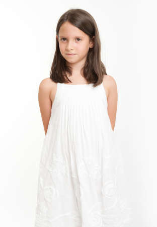 Young girl in white dressの写真素材