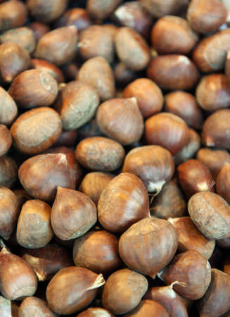 Chestnuts on a market stall, ideal for backgroundsの写真素材
