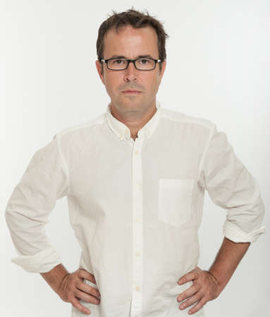 Man with glasses and a grave expressionの写真素材