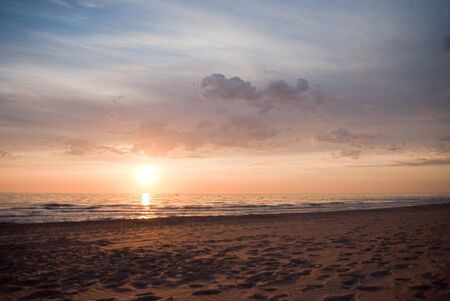 Empty beach at sun setの写真素材