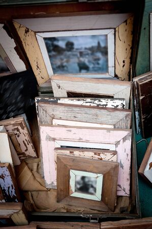 Old vintage picture frames with peeling off paint
