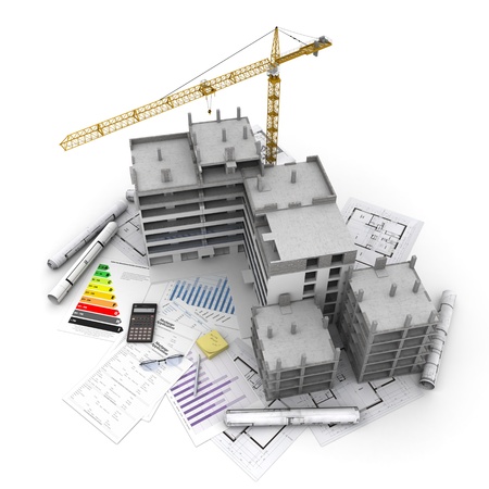 Building under construction with crane, on top of blueprints, mortgage applications and energy ratingの写真素材