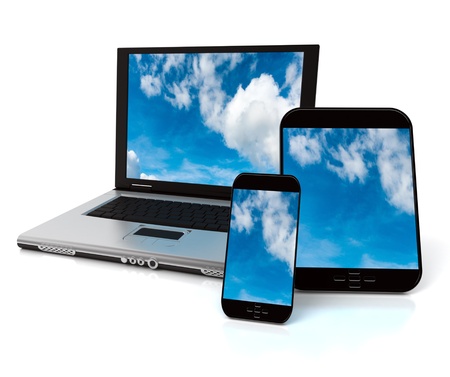 A tablet, a mobile phone and a laptop with a sky with clouds on the screensの写真素材