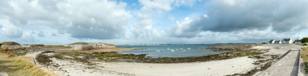 Panoramic view of the coast in France,Brittany, with typical houses, bunkers, fortifications and wild natureの写真素材