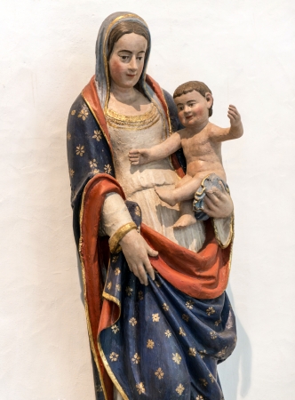 Old statue of the Virgin Mary with Childの写真素材