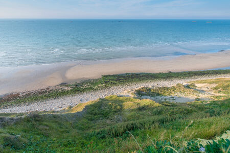 Beautiful Normandy beach, with remains of the Landingの写真素材