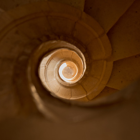 Stone spiral staircase in a Portuguese abbeyの写真素材