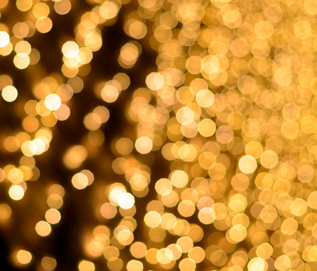 Defocused Christmas bright golden lights ideal for backgrounds