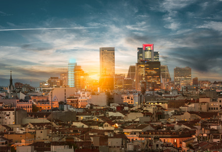 With Madrid skyline contrasting old buildings and new towersの写真素材