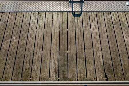 Boardwalk in a Marina wood, and metal