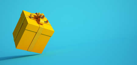 3D rendering of a gift box in yellow and turquoiseの写真素材