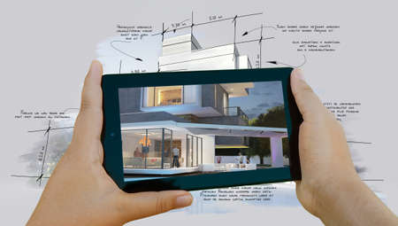 3D rendering of a hand draw architecture project with a tablet showing the finished houseの写真素材