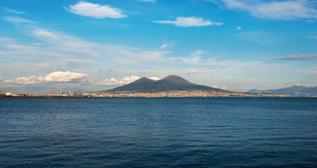 View of the coastline from Naples with the Mount Vesuviusの写真素材