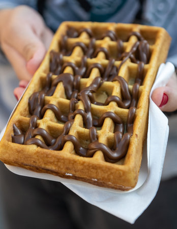 A delicious waffle with hazelnut chocolate cream