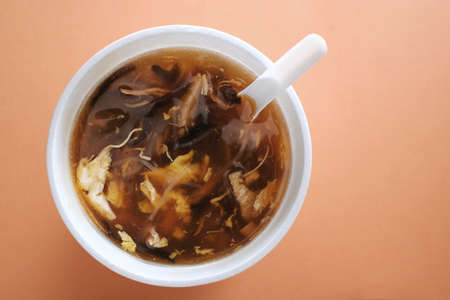 Top view of a bowl of Hong Kong-Style Imitation Shark Fin Soup, a very popular street snack in Hong Kongの写真素材