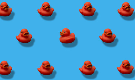 Trendy pop art design of a red rubber duck pattern. Concept of creativity, different, excluded,...