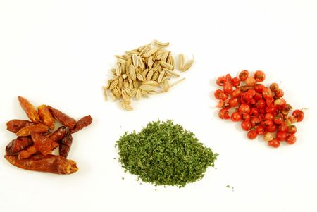 Fennel, red pepper, pink pepper, parsleyの写真素材