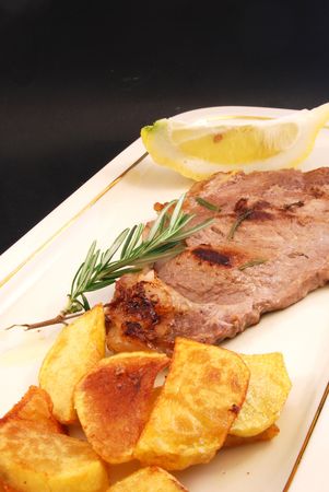 Meat steak with potatoesの写真素材