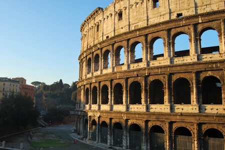 A striking image of the Coliseum of Rome at dawn