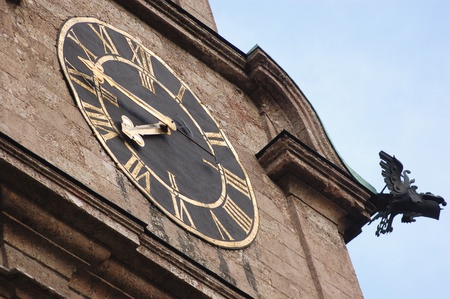 The clock of church of Innsbruck - Austriaの写真素材
