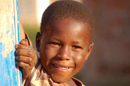 The look of Africa on the faces of children  - Village Pomerini - Tanzania - August 2013 -The intensity of the look of the African children of the Village Pomerini  in Tanzania - Between poverty and disease our help is the only hope for the futureのeditorial素材