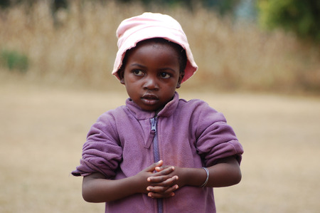The look of Africa on the faces of children  - Village Pomerini - Tanzania - August 2013 -The intensity of the look of the African children of the Village Pomerini  in Tanzania - Between poverty and disease our help is the only hope for the futureのeditorial素材