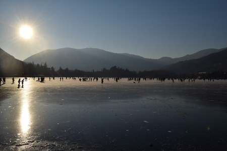 Fun on the ice - Lake Endine - Bergamo - Lombardy - Italyの写真素材