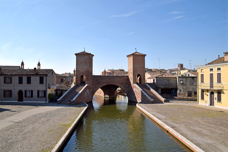 Panoramic view of the Porta dei Torrioni entrance of the village of Comacchio in the province of Ferrara - Italyのeditorial素材
