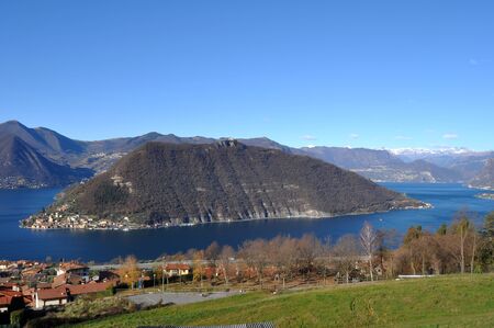 Panoramic image of Lake Iseo and the town of Peschiaera in Montisola in the province of Brescia - Lombardy - Italyの写真素材