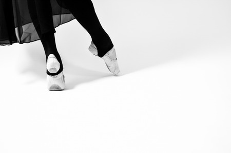 black and white photo of ballet dancer on a white backgroundの写真素材