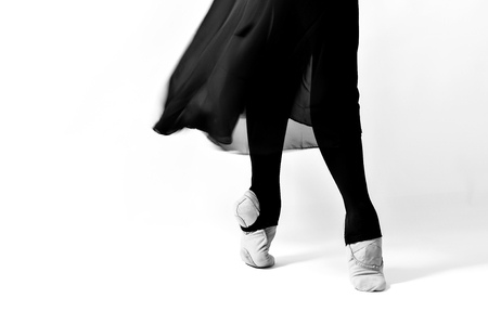 black and white photo of ballet dancer on a white backgroundの写真素材
