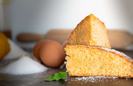 Lemon sponge cake and background with ingredients