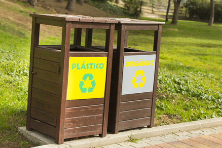 recycle bins in the parkの写真素材