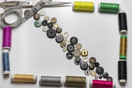 Sewing business. Image of sewing objects on white background and space for you to insert your  or...