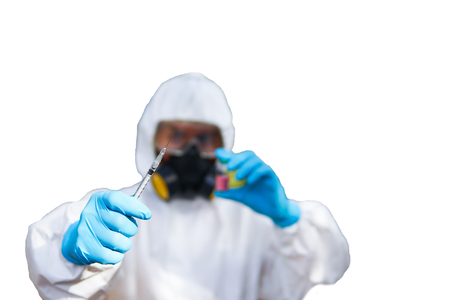 doctor or scientist in laboratory holding a syringe on white bacground,selective focusの写真素材